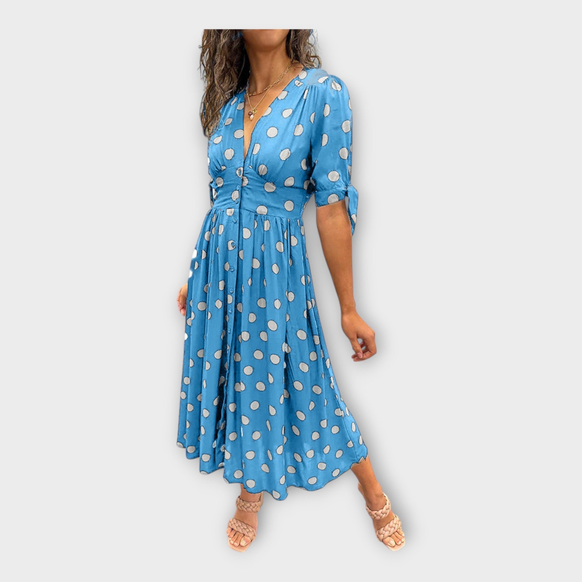 Elegantna obleka z modernim vzorcem in brezčasno eleganco