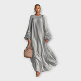 Zračno dolgo obleko z elegantnimi detajli