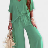 Zračni set z širokimi hlačami in ohlapno bluzo