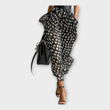 Dolga obleka z rafinirano in brezčasno estetiko