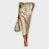 Obleka z rafinirano eleganco