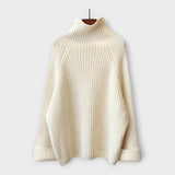 Komplet z visokim ovratnikom, hlačami in brezrokavnikom