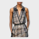 Elegantna obleka z modernimi podrobnostmi in rafiniranim oblikovanjem